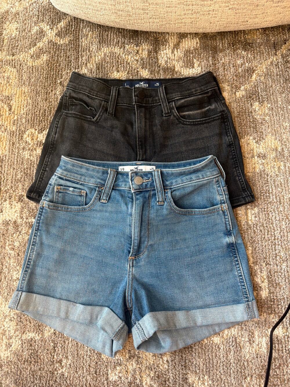 Two pairs of 25w Hollister Jean shorts
Color:Black & Medium Wash